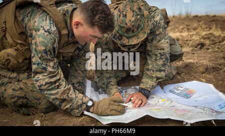 U.S. Marine Corps Cpl. Grayson Mosemak, a machine gunner with 3d ...