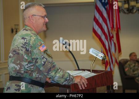 Brig. Gen. Paul H. Pardew, commanding general, U.S. Army Contracting Command, shares the opening remarks during a change-of-command ceremony for the 408th Contracting Support Brigade at the Carolina Skies Club and Conference Center at Shaw Air Force Base, South Carolina, June 22, 2018. Stock Photo