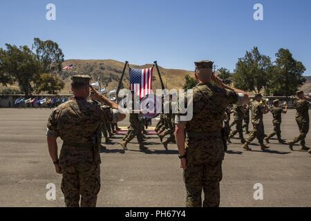 U.S. Marines with 2nd Battalion, 11th Marine Regiment, 1st Marine Division, participate in a change of command ceremony at Marine Corps Base Camp Pendleton, Calif., June 21, 2018. The change of command ceremony represented the official passing of authority from the offgoing commander, Lt. Col Patrick F. Eldridge, to the incoming commander, Lt. Col. Caleb Hyatt. Stock Photo