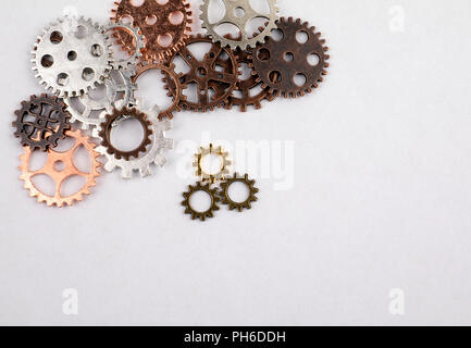 Different sizes and colored gears on a white background Stock Photo