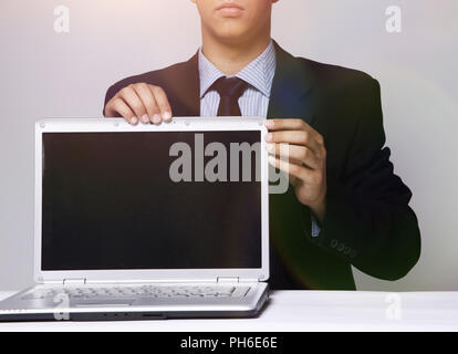 closeup.businessman shows a stylish notebook Stock Photo