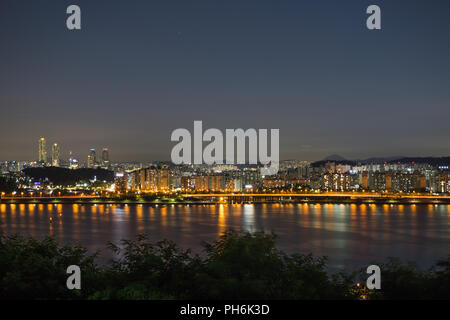 Night view of apartment and Traffic blur by Han River in Seoul, South Korea Stock Photo
