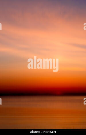 Impressionist rendition of sunset over the Irish Sea from the North Wales coast Stock Photo