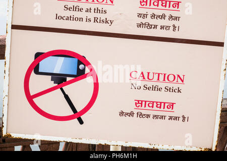 Sign in English and Hindi warning people against taking selfies for safety reasons Stock Photo