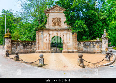 PUENTE SAN MIGUEL, CANTABRIA, SPAIN - JUNE 22, 2018. Stone door with entrance to the Historical Garden San Miguel Bridge (Cantabria, Spain) owned by t Stock Photo