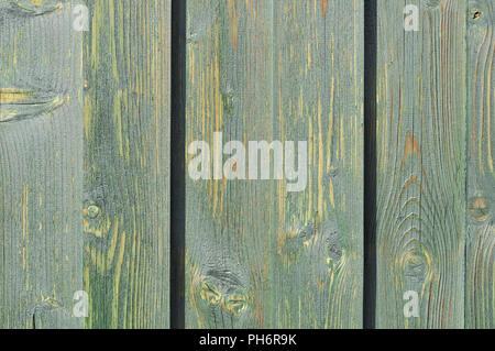 Background from wooden boards with weathered green color. Stock Photo