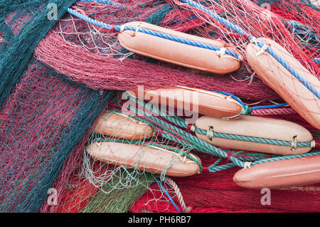 Piles of fishing nets Stock Photo