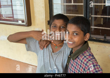 Mumbai, India - July 8, 2018 - Indian kids having fun in front of school building Stock Photo