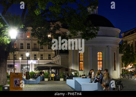 Baden: square Josefsplatz, restaurant in former spa Josefsbad, young people sitting, Wienerwald, Vienna Woods, Niederösterreich, Lower Austria, Austri Stock Photo