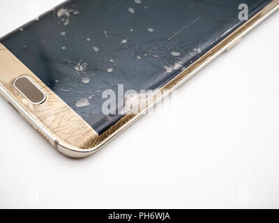 close-up of damaged smartphone display with white background concept Stock Photo