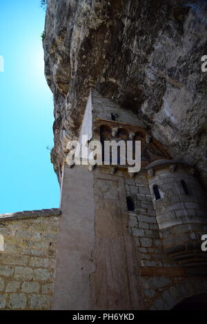 The Basilique St-Sauveur, a pilgrimage church and cloister in the medieval village of Rocamadour in the Lot department of France Stock Photo