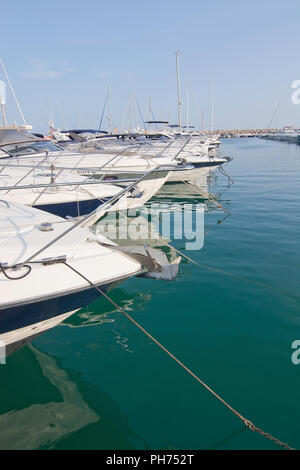 MALLORCA, SPAIN - AUGUST 30, 2018: Luxury yachts in Puerto Portals marina on a late summer sunny afternoon on August 30, 2018 in Mallorca, Spain Stock Photo