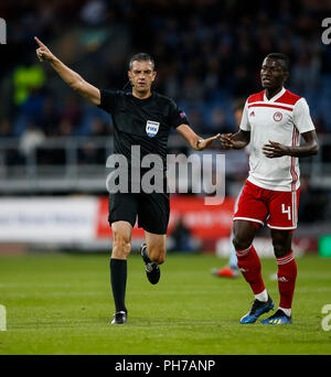 Burnley, UK. 30th August 2018. Referee Viktor Kassai during the UEFA Europa League Play-Off Round second leg match between Burnley and Olympiakos at Turf Moor on August 30th 2018 in Burnley, England. Credit: PHC Images/Alamy Live News Stock Photo