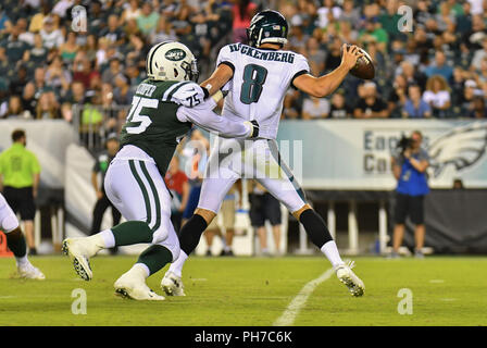 Philadelphia, USA. 30th Aug 2018. August 30, 2018: Quarterback Christian Hackenberg (8) of the Philadelphia Eagles throws under pressure during a preseason game against the New York Jets at Lincoln Financial Field in Philadelphia, Pennsylvania. Gregory Vasil/Cal Sport Media Credit: Cal Sport Media/Alamy Live News Stock Photo