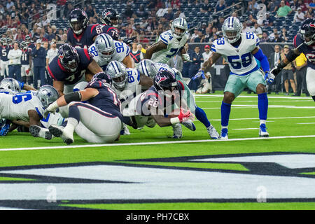 Houston, USA. 30th Aug 2018. August 30, 2018: Houston Texans tight end  Jordan Akins (88) gets wrapped up by Dallas Cowboys defensive back Tyree  Robinson (23) during the 1st quarter of a