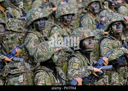 Putrajaya, Kuala Lumpur, Malaysia. 29th Aug, 2018. The Malaysian Armed Forces seen taking part in full rehearsal ceremony at the 61st Malaysia anniversary of independence day at Dataran Putrajaya.Malaysians celebrated 61st anniversary of the nation's independence day on every 31st August. The Prime Minister of Malaysia, Dr. Mahathir Mohamad had chosen Putrajaya the nation's administrative capital as a venue for the celebration. This year's slogan will be ''˜Sayangi MalaysiaKu' which means ''˜Love My Malaysiaâ Credit: Faris Hadziq/SOPA Images/ZUMA Wire/Alamy Live News Stock Photo