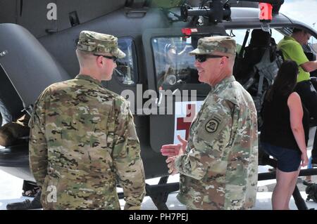 Iowa National Guard Adjutant General, Maj. Gen Tim Orr, visits with his Soldiers assigned to A Co. 1-376 AVN BN deployed to Germany supporting real world MEDEVAC missions in Hohenfels and Grafenwoehr military bases Stock Photo