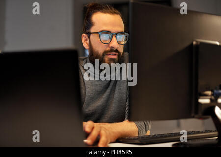 close up of creative man working at night office Stock Photo