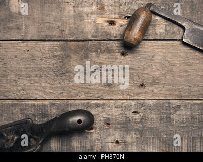 Carpenter tools on a rustic wooden background with space for text Stock Photo