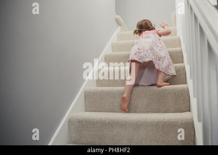 Children going up on stairs barefoot. Concept childhood image with copy ...