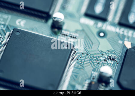 Modern printed electronic circuit board close up. Abstract hi-tech background Stock Photo