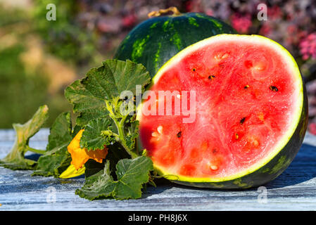 Close up delicious sliced watermelon on wooden board . Selective focus. Organic summer diet concept Stock Photo