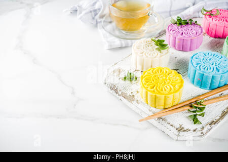 Traditional Chinese Mid-Autumn Festival food, colorful rice cakes snowskin mooncakes with variety of fillings, Stock Photo