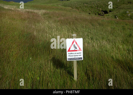 Scotland. Sutherland. Handa Island. Sign warning of presence of puffins Stock Photo