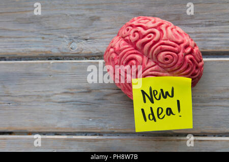 New idea label stuck on a brain Stock Photo