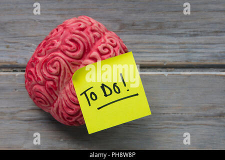 To do label stuck on a brain Stock Photo