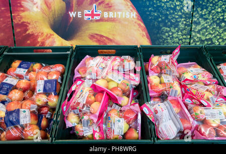 Pinkids Apples in plastic packaging in Aldi supermarket. UK Stock Photo