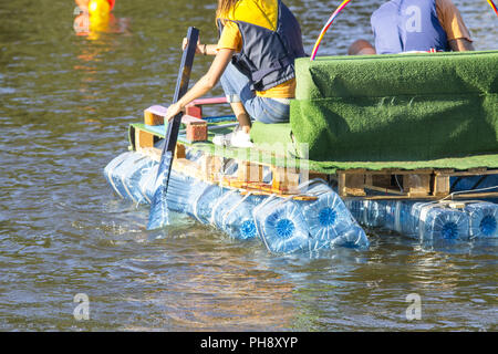 rafts made of recycled plastic bottels to teach reuse Stock Photo