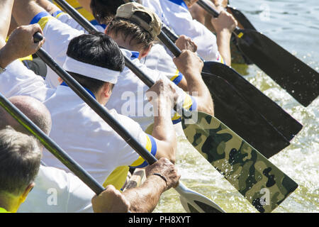 effort during a canoe race Stock Photo