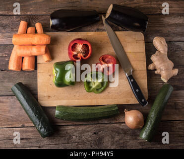 MIxed colorful vegetables on board, from overhead flat lay Stock Photo