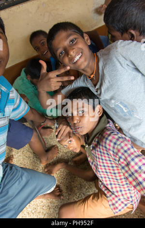 Mumbai, India - July 8, 2018 - Indian kids having fun in front of school building Stock Photo