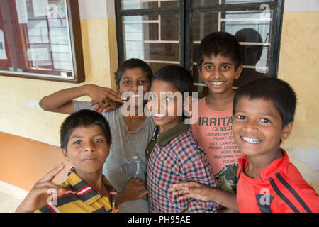 Mumbai, India - July 8, 2018 - Indian kids having fun in front of school building Stock Photo