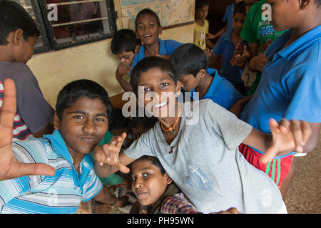 Mumbai, India - July 8, 2018 - Indian kids having fun in front of school building Stock Photo