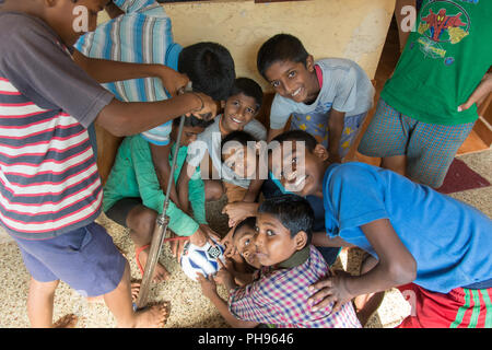 Mumbai, India - July 8, 2018 - Indian kids having fun in front of school building Stock Photo