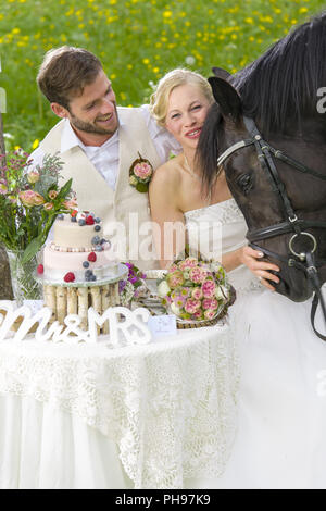 bridal couple in garden wedding Stock Photo