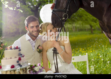 bridal couple in garden wedding Stock Photo