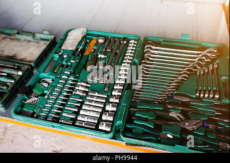 Metal rack with set of wrench spanners tools Stock Photo - Alamy