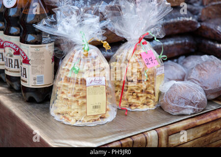 Polish-Lithuanian traditional spit cake called in šakotis or raguolis or Polish sękacz sold at the street market in Krosno, Poland Stock Photo