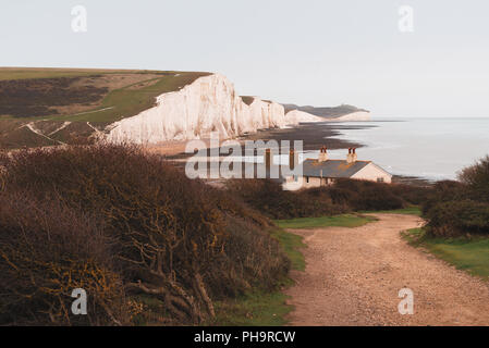 Seven Sisters famous cliffs and road to coast guard cottages, Eastbourne, East Sussex, England Stock Photo