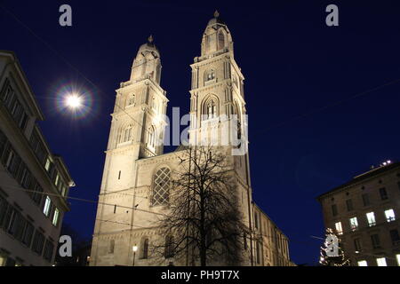 Night view of Grossmunster Cathedral in downtown Zurich Stock Photo