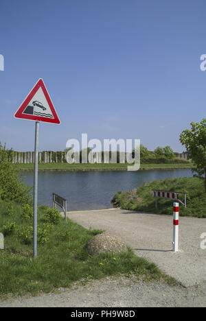 Danger sign nearby the Main-Danube-Channell, Nuremberg, Germany Stock Photo