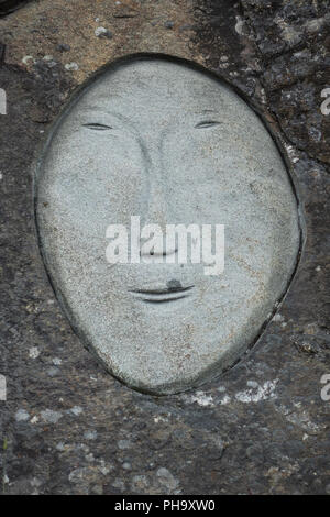 Denmark, Greenland, Qaqortoq, Inuit rock carvings, face Stock Photo