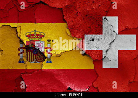 flags of Spain and Switzerland painted on cracked wall Stock Photo - Alamy