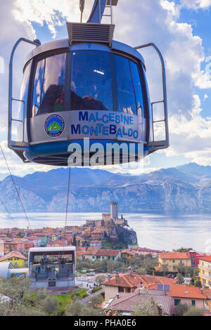 Cable car coming to the village of Malcesine, Lake Garda, Verona province, Veneto, Italian Lakes, Italy, Europe Stock Photo