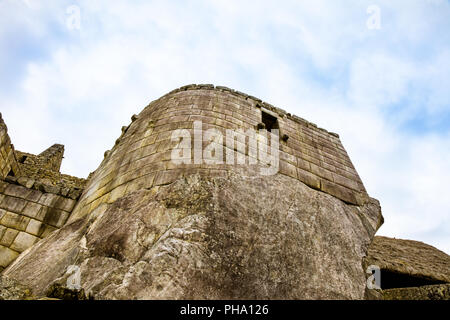 Sun Temple in the sanctuary of Machu Picchu Ruins, Sacred Valley, near Agua Calientes, Peru Stock Photo