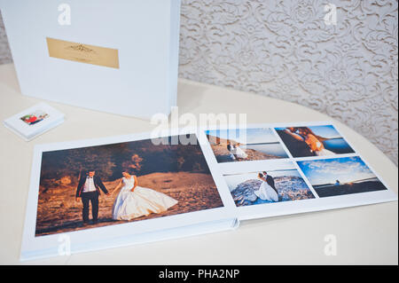 Luxury white leather wedding photo album and photo book Stock Photo